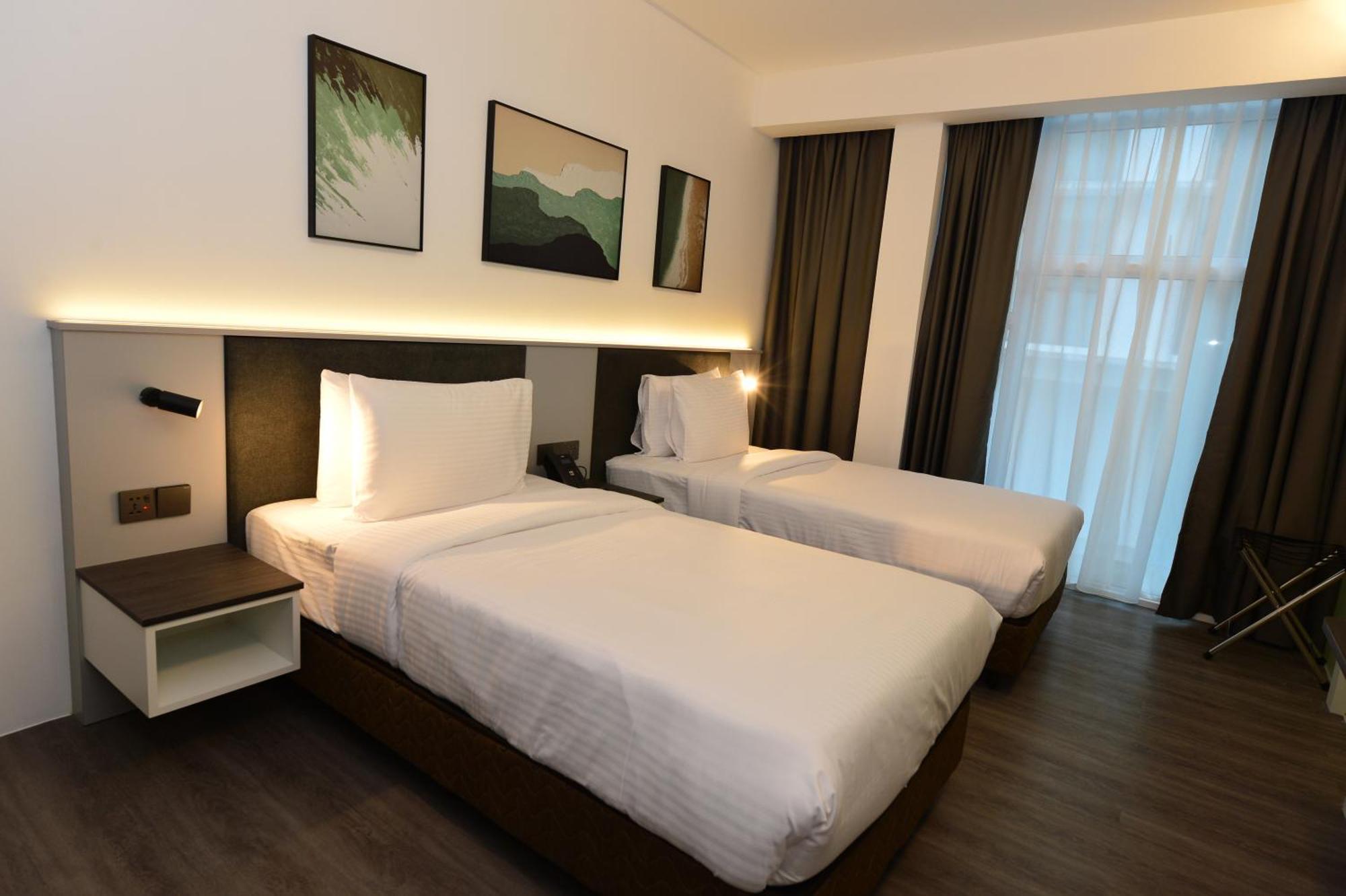 Rume Hotel Kuching Bagian luar foto